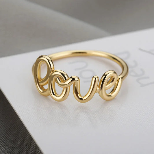 Amora – Gold Stainless Steel "Love" Ring