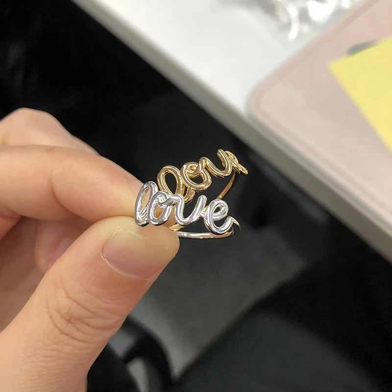 Amora – Gold Stainless Steel "Love" Ring